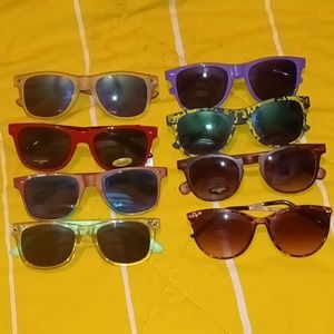 8 pair of men's and women's sunglasses
